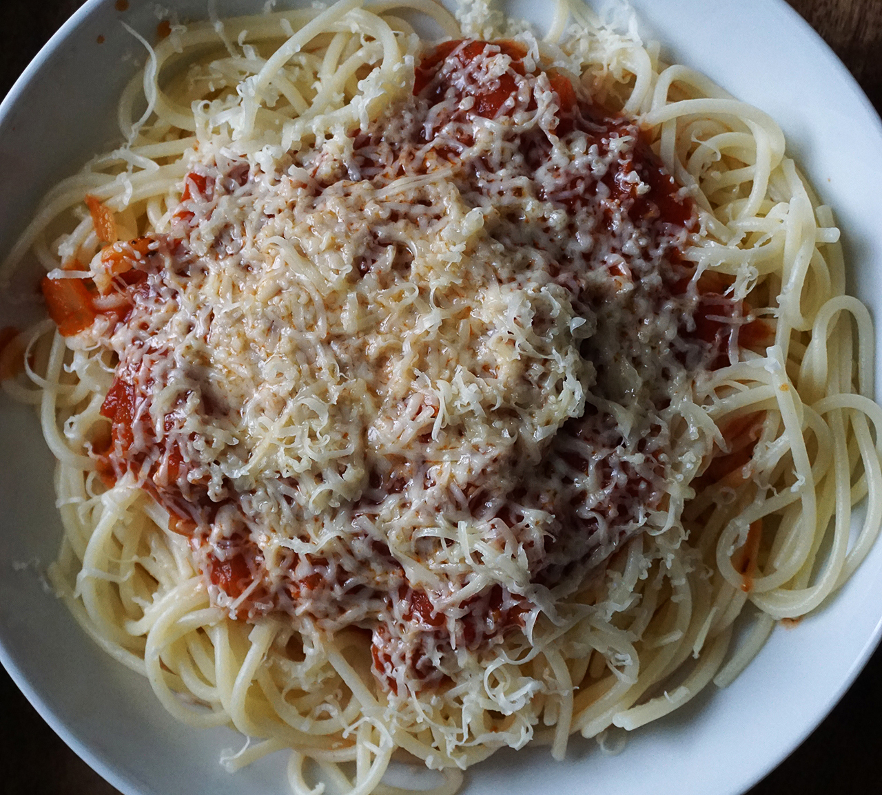 Gluten free spaghetti with basic tomato sauce and cheese