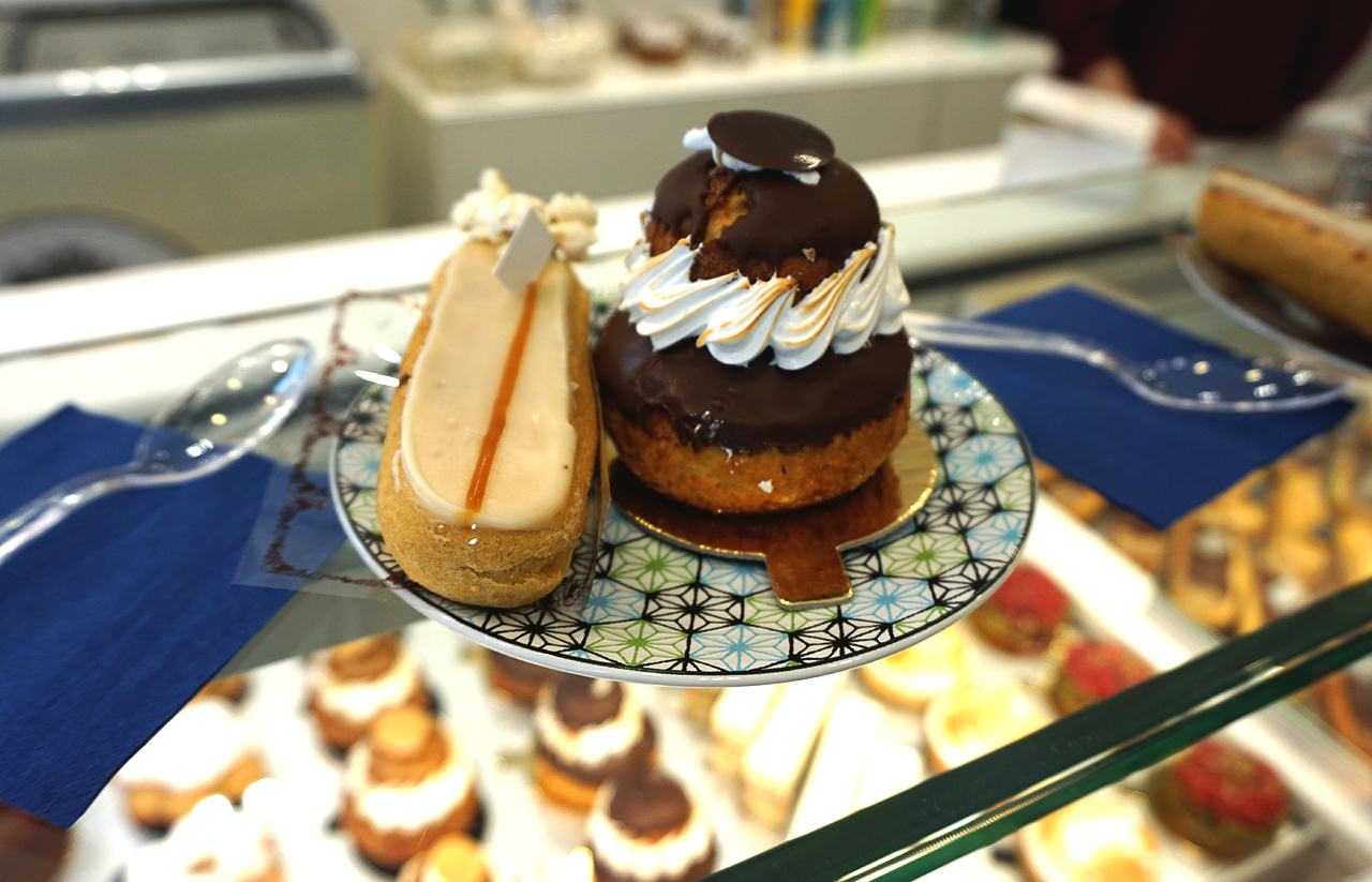 Gluten free salted caramel eclair and chocolate profiterole cake from Helmut Newcake