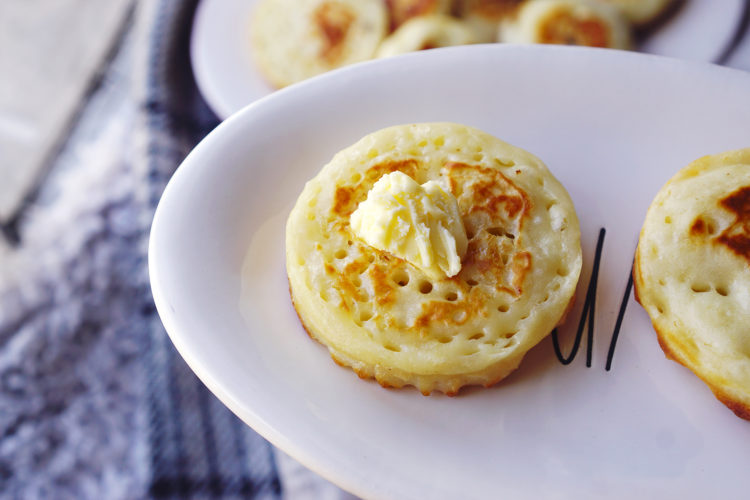 Homemade gluten free crumpets with butter