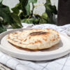 Homemade gluten free pita bread that puff up / with a pocket of air inside