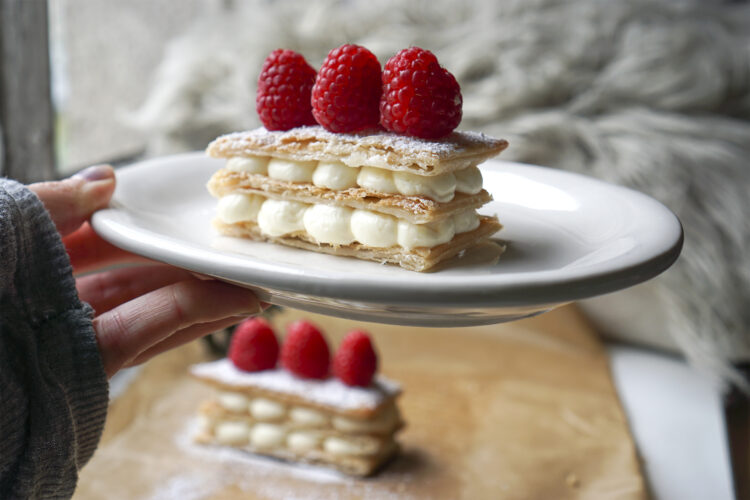 Super quick and easy cream cheese mille feuille made with Just Rol gluten free puff pastry + icing sugar and raspberries on top