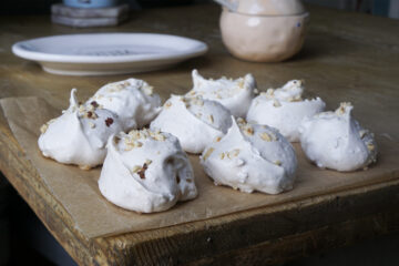 Simple Hazelnut meringues with a sprinkle of chopped hazelnuts on top